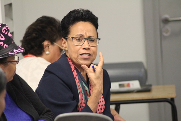 Dr Roli Degazon-Johnson introduced Professor Harris. Photo courtesy CaribDirect

